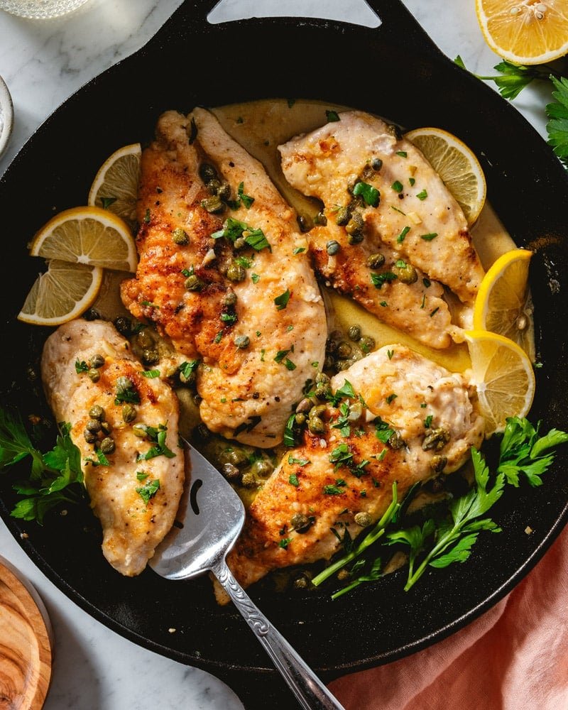 Chicken Piccata recipe in pan with capers and lemon butter sauce