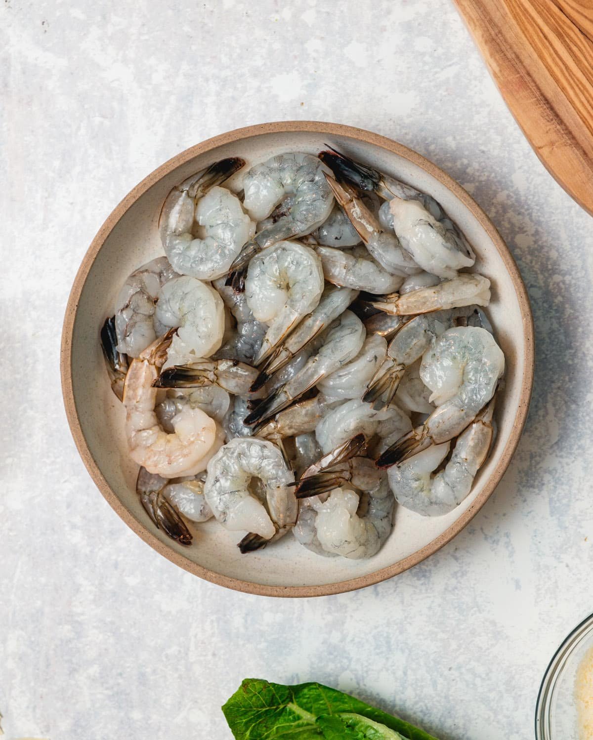 Overhead view of raw strip in a bowl.