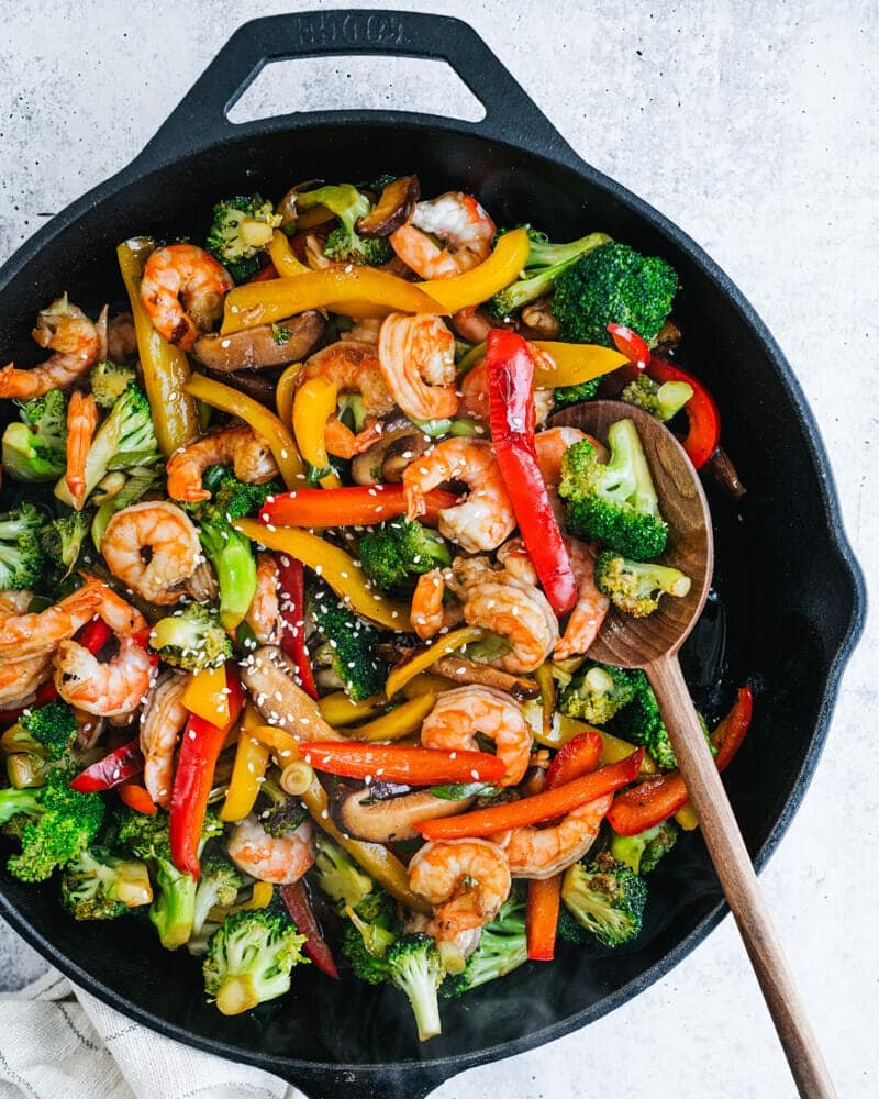 Shrimp Stir Fry with broccoli and peppers in a frying pan